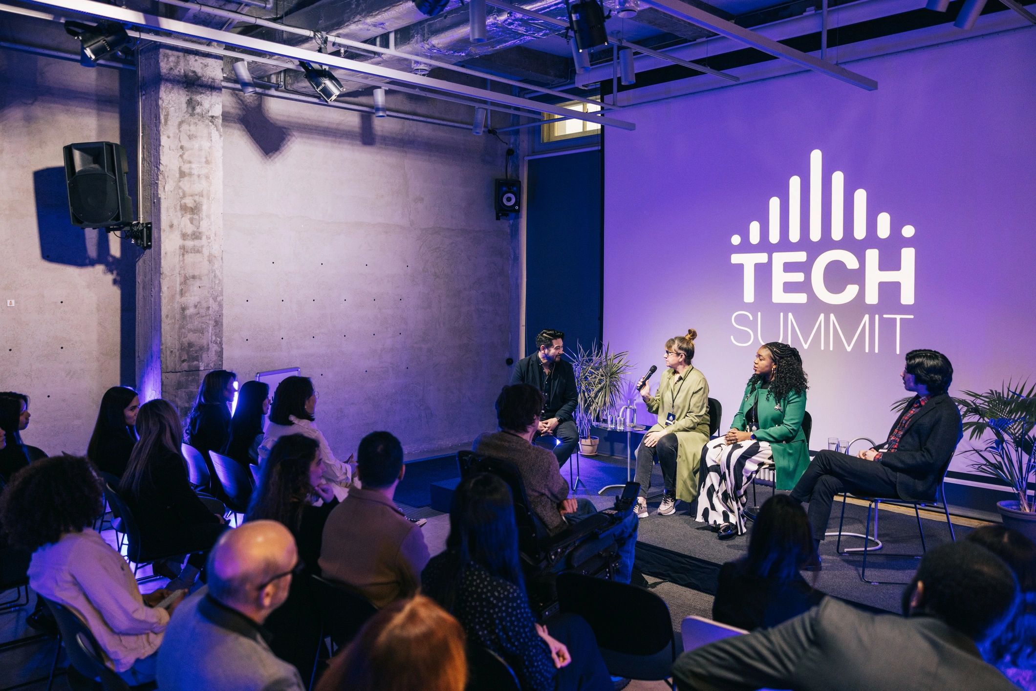 Audience listening during a panel discussion