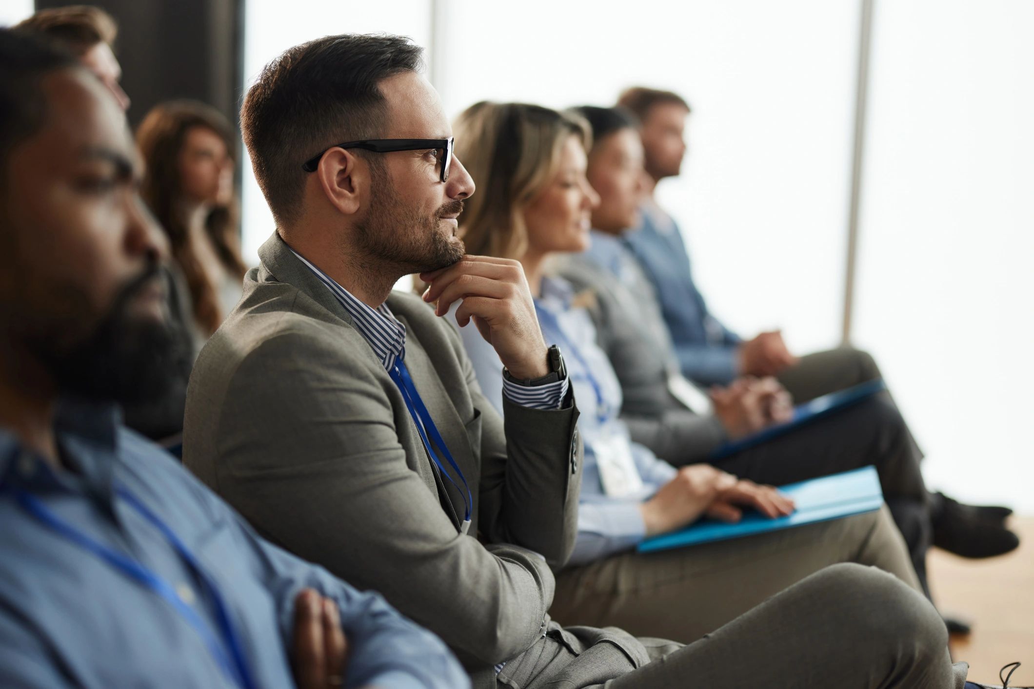Conference attendees in a boardroom seminar