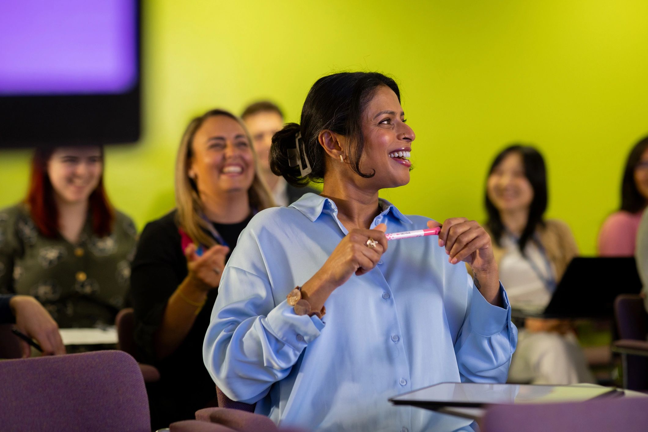Attendees engaged during a conference session