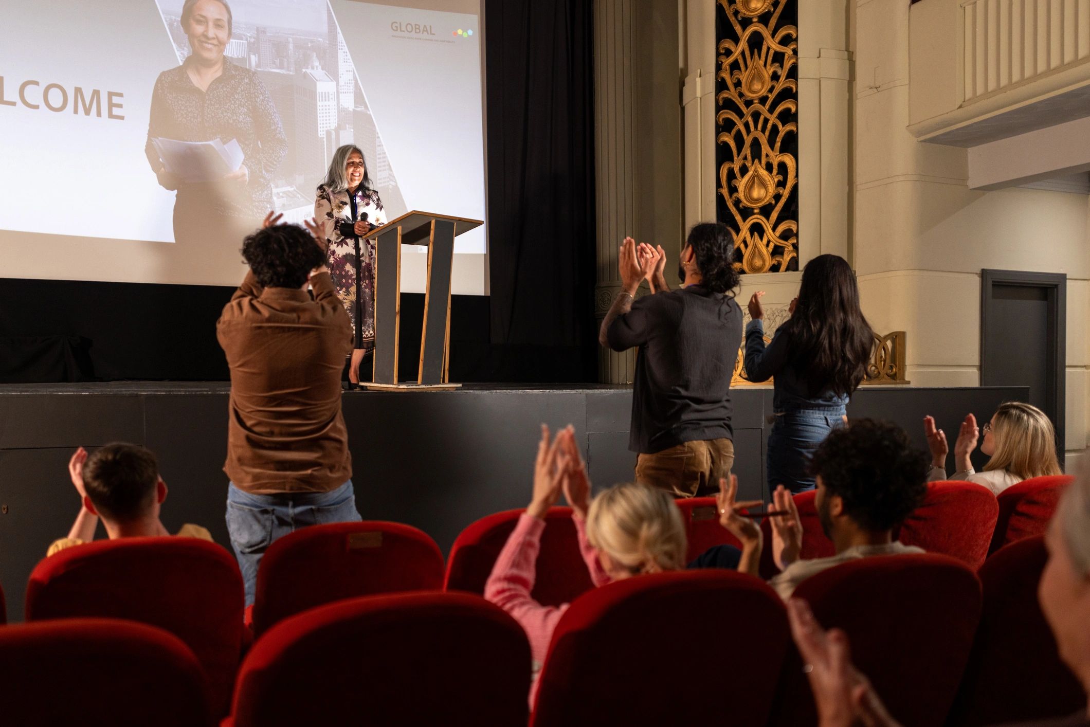 Speaker engaging an audience during a conference session