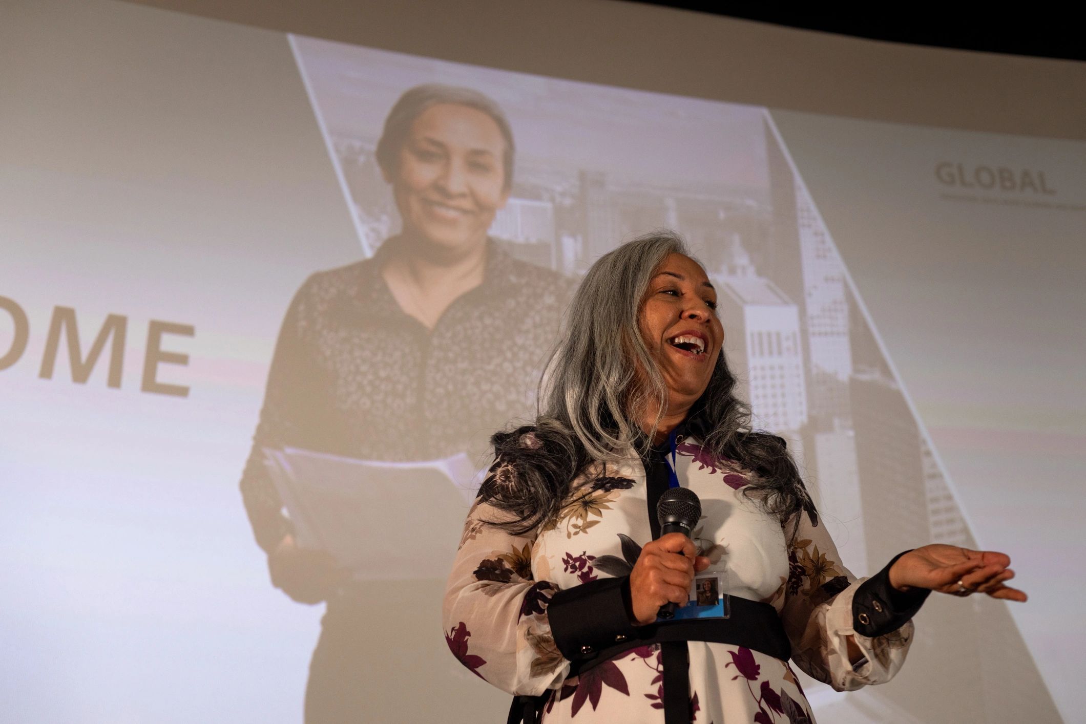 Keynote speaker addressing an audience at a conference