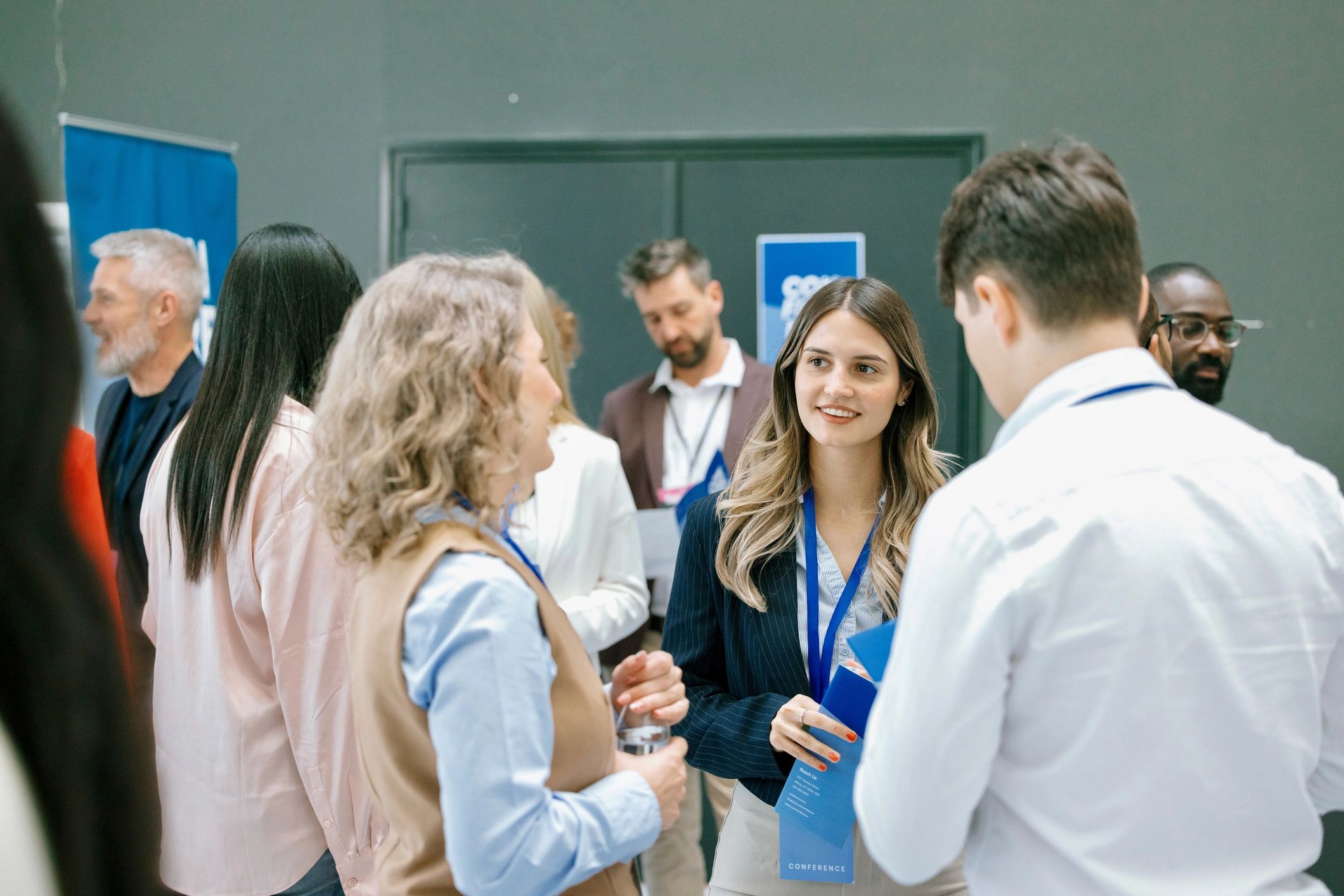 Delegates in conversation at a networking event