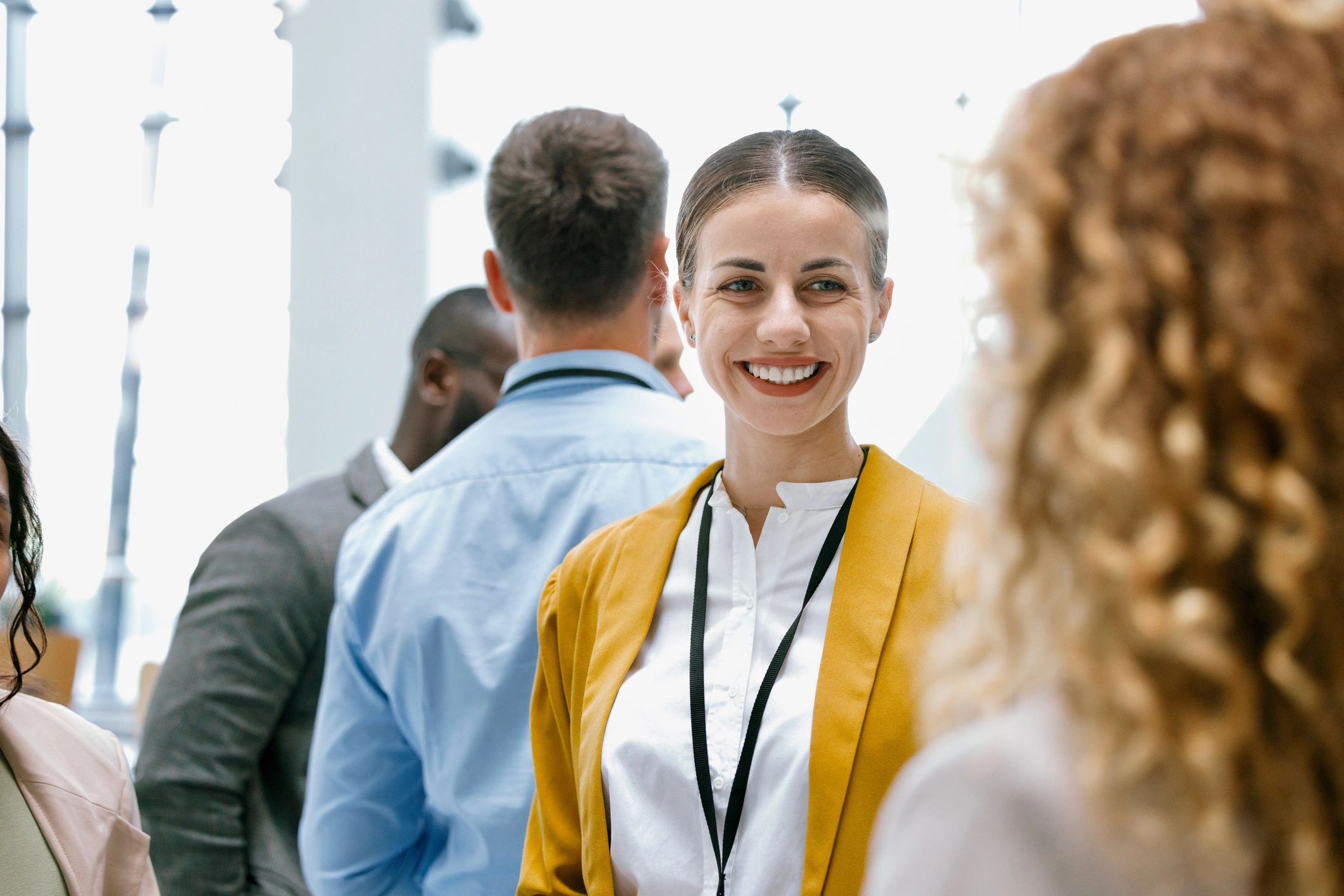 Leaders in conversation during a conference intermission