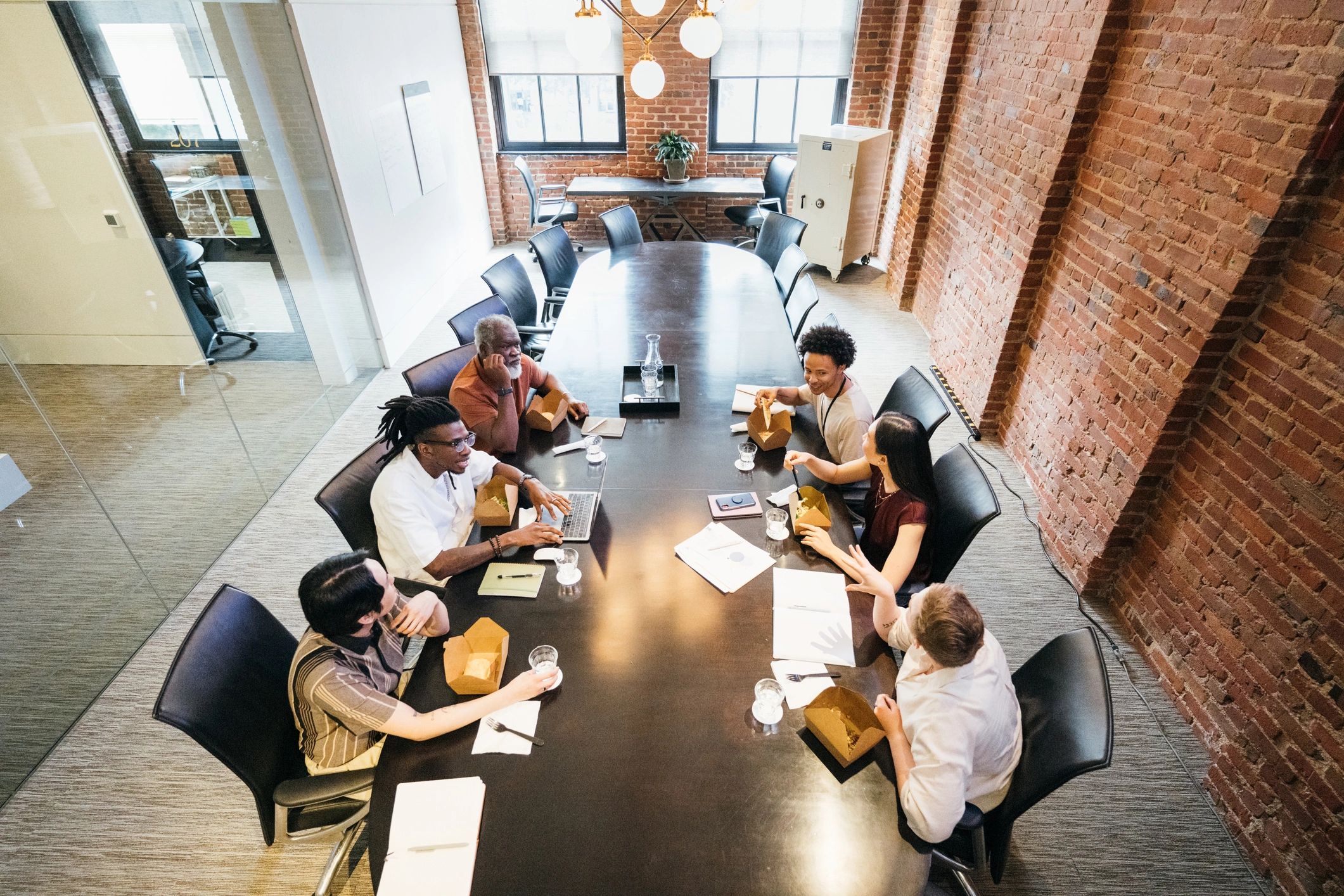 Attendees gathered for a breakout meeting in a conference room