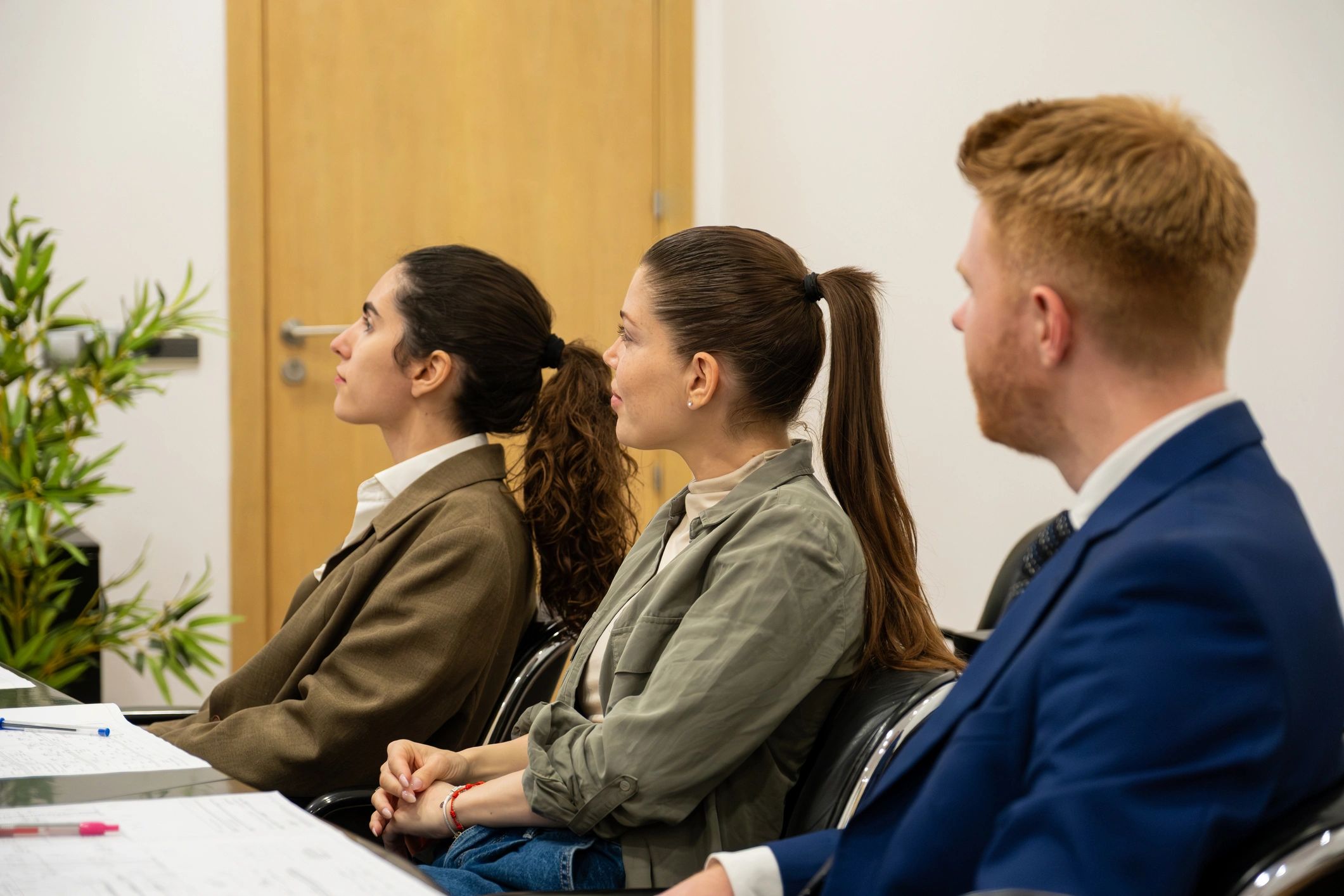 Attendees listening attentively at a seminar